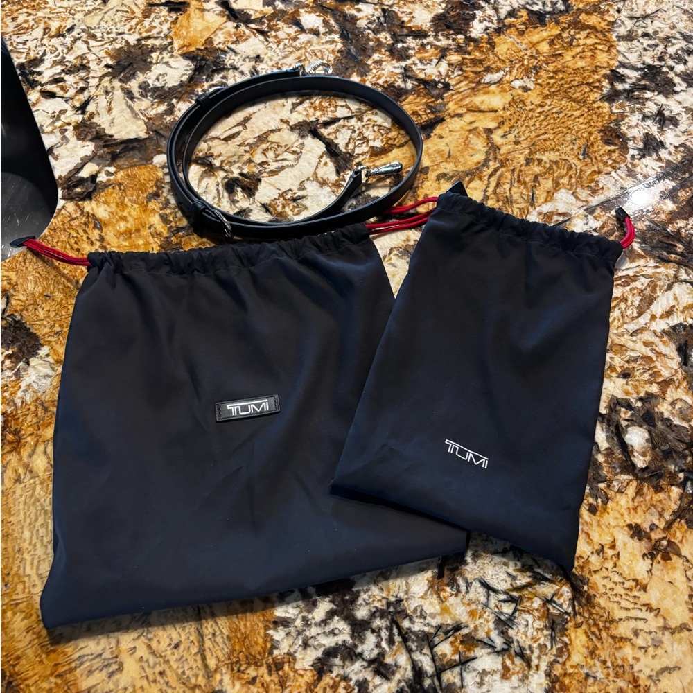 2 Small TUMI Black Travel Bags & a NEW TUMI leather adjustable purse/bag strap